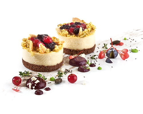 Lemon and thyme cream tartlet with pistachio sponge, berry topping and caramelised white chocolate, ø 5 cm.